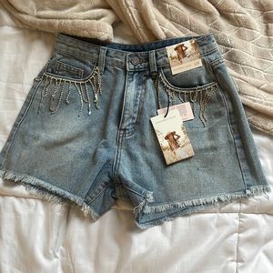 Light/medium wash Jean shorts with rime stone detail from Sincerely Jules